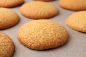 Fototapeta na wymiar Delicious Danish butter cookies on baking tray, closeup