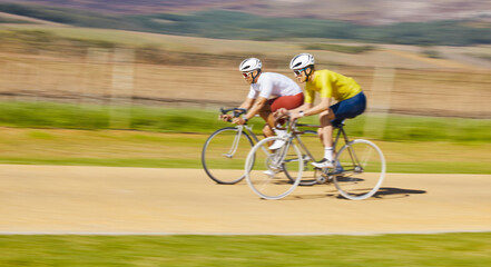 Fitness, countryside or men cycling on a bicycle for training, cardio workout or race exercise together. Speed blur, healthy friends or sports athletes riding a bike off road or path for challenge