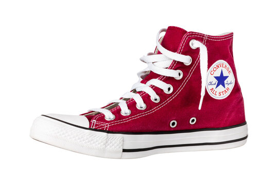 UKRAINE, DNEPR - JUNE 25, 2023: Converse all star high top red sneakers on a white background