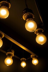 A Group Of Light Bulbs Hanging From A Ceiling