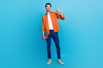 Full size portrait of positive attractive person arm hold netbook demonstrate thumb up approval...