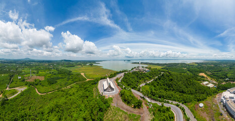 Aerial view of Our lady of Lourdes Virgin Mary catholic religious statue on a Nui Cui mountain in Dong Nai province, Vietnam.