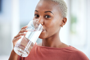 Health, glass and portrait of a woman drinking water for hydration, wellness and liquid diet....