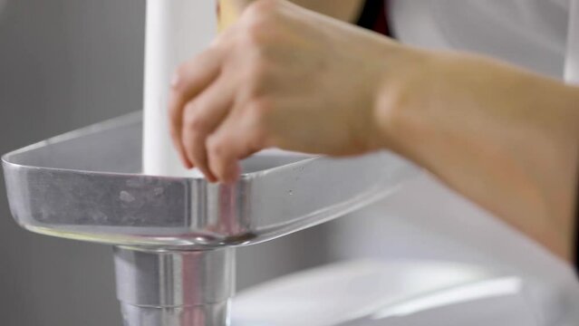 making minced meat in the kitchen