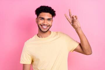Photo of friendly dude showing two fingers v sign say hi hello greet his friends wear shirt...
