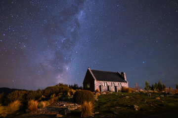 The milky way rises behind the Church of the Good Shepherd at Lake Tekapo, New Zealand. - obrazy, fototapety, plakaty