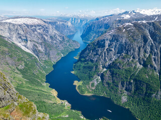 Landscape photo of river or fjord and mountains