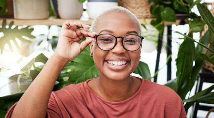 Black woman, glasses and vision with smile in portrait, eye care and optometry with frame and...