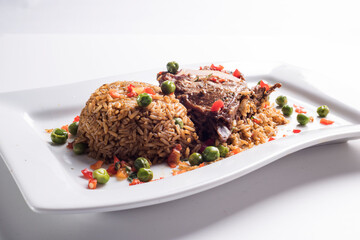 ARROZ CON PATO, RICE WITH DUCK, PERUVIAN GASTRONOMY DISH 