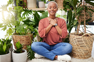 Peace, breathe and calm woman by plants for meditation exercise in a greenery nursery. Health,...