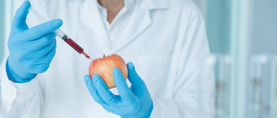 Scientist check chemical food residues in laboratory. Control experts inspect quality of fruit,...