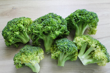 Fresh broccoli on the wooden table. High quality photo