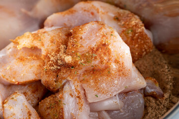 chicken fillets marinated in spices close-up