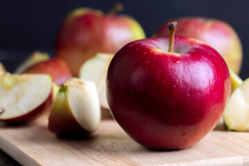 Sliced ripe apple of red color
