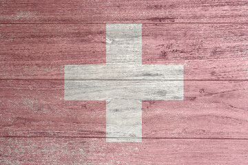 Switzerland Flag on old wood texture background. Happy 1. August. Switzerland Independence Day.