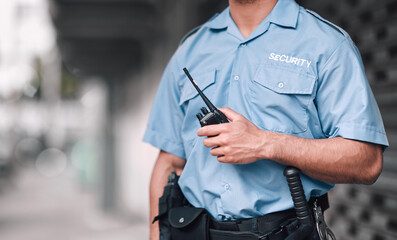 Walkie talkie, security guard or safety officer man on the street for protection, patrol or watch....