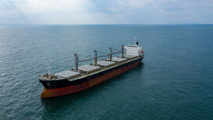 Fototapeta na wymiar Self-unloading bulk carrier at Rio De La Plata anchorage. Aerial front view.