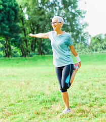 outdoor senior fitness woman man lifestyle active sport exercise healthy fit retirement stretching...