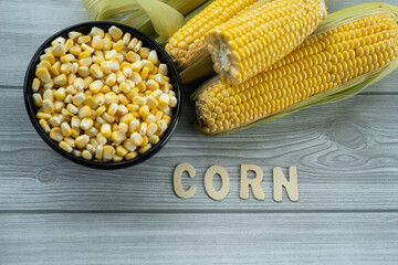 Corn month concept image fresh corn on the cob with seeds 