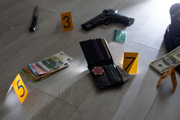 High contrast image of a crime scene with evidence markers