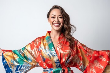 Fototapeta na wymiar Beautiful young woman in a kimono on a white background