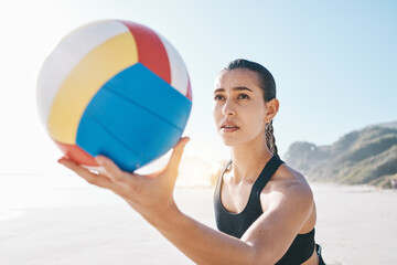 Beach, exercise and woman with volleyball to serve for games, fun and sports in sunshine. Face of...