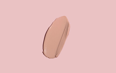 Cosmetic smear of cream texture on a pink background. Toning cream for the skin. Skin care.
