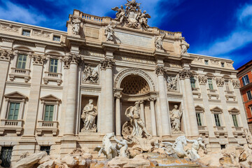 Fototapeta na wymiar Trevi fountain in the center in Rome, Italy. Trevi is most famous fountain of Rome