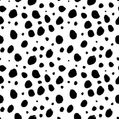 Grunge spots hand drawn vector seamless pattern. Blobs and blotches background. Irregular organic dots and blots ornament. Cheetah spots black print. Seamless pattern with scattered round dots.