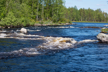 Mountain, northern rivers with a threshold and a waterfall. Republic of Karelia