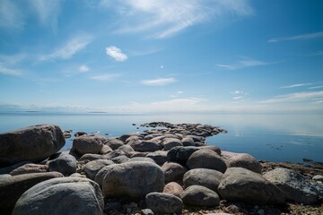 The rocky shore of the Baltic Sea. Beautiful sunny summer day, calm sea. Baltic Sea Estonia Kihnu Island