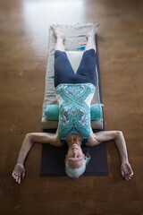 Restore Yourself senior yoga woman. 