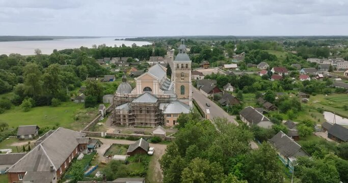 circular flight and aerial view neo baroque temple or catholic church in countryside