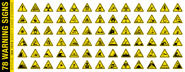 Full set of 78 isolated hazardous symbols on yellow round triangle board warning sign. Official ISO 7010 safety signs standard. - obrazy, fototapety, plakaty