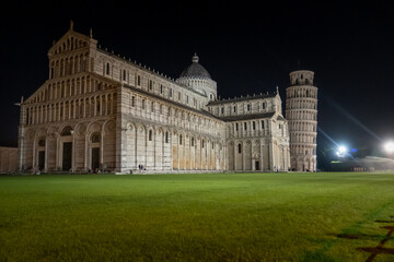 Fototapeta na wymiar Leaning Tower of Pisa, Piazza dei Miracoli in Pisa, Tuscany, Italy and Pisa Cathedral, twilight night view