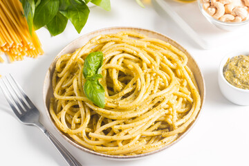 Spaghetti pasta with pesto sauce, basil, cashew and parmesan. Ingredients. 