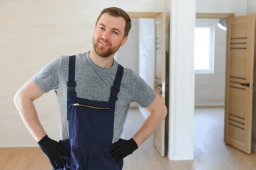 Process of construction new and modern modular house from composite sip panels. Worker man in...