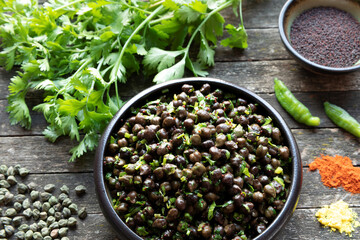 Green Chickpea Chaat meal with ingredients: fresh coriander, black mustard seeds, dried green...