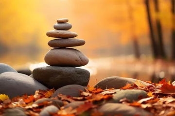Fotobehang Pile of zen stones in the autumn forest. © Ployker