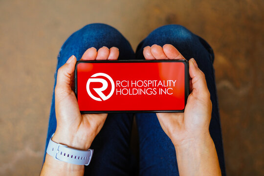 July 5, 2023, Brazil. In this photo illustration, the RCI Hospitality Holdings logo is displayed on a smartphone screen.