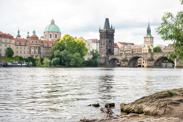 Amazing view on Charles bridge and historical center of Prague, buildings and landmarks of old town, Prague, Czech Republic
