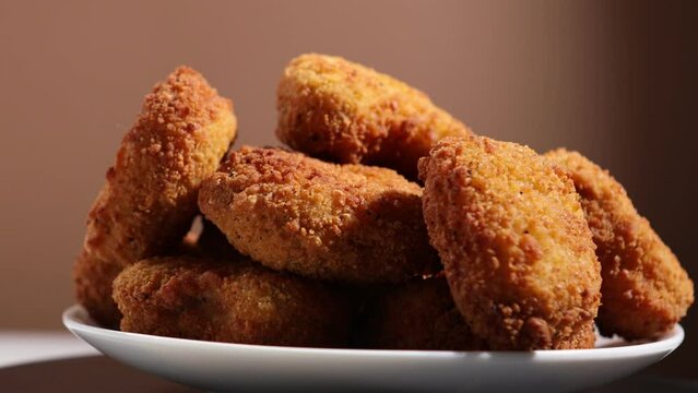 rotation of chicken nuggets with spice