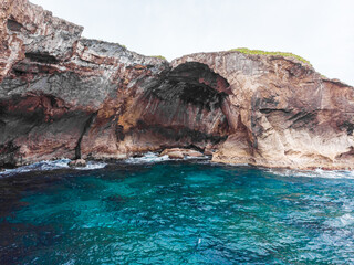 Cueva del indio coast landscape with rock arc shape formation at daylight from arecibo puerto rico