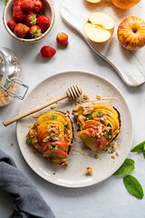 Toasts with peanut butter, apples and honey. Healthy breakfast food or snack.