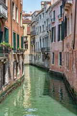 Picturesque Scene from Venice with the narrow water canals.
