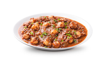 meat in sauce on round white plate