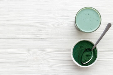 Spirulina algae powder and green latte, top view. Super food concept