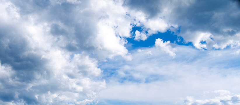 Blue sky with thick clouds shot at 38 mm focal length