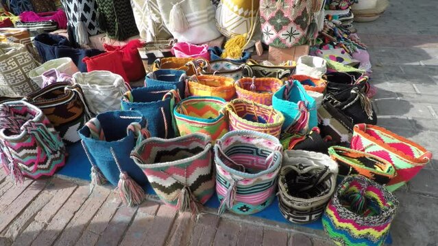Colorful Hand Woven Bags and Other Products - Handicrafts sale in the streets of a city in Colombia
