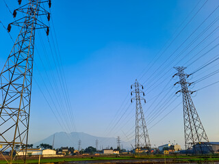 Extra high voltage air channels under clear blue background